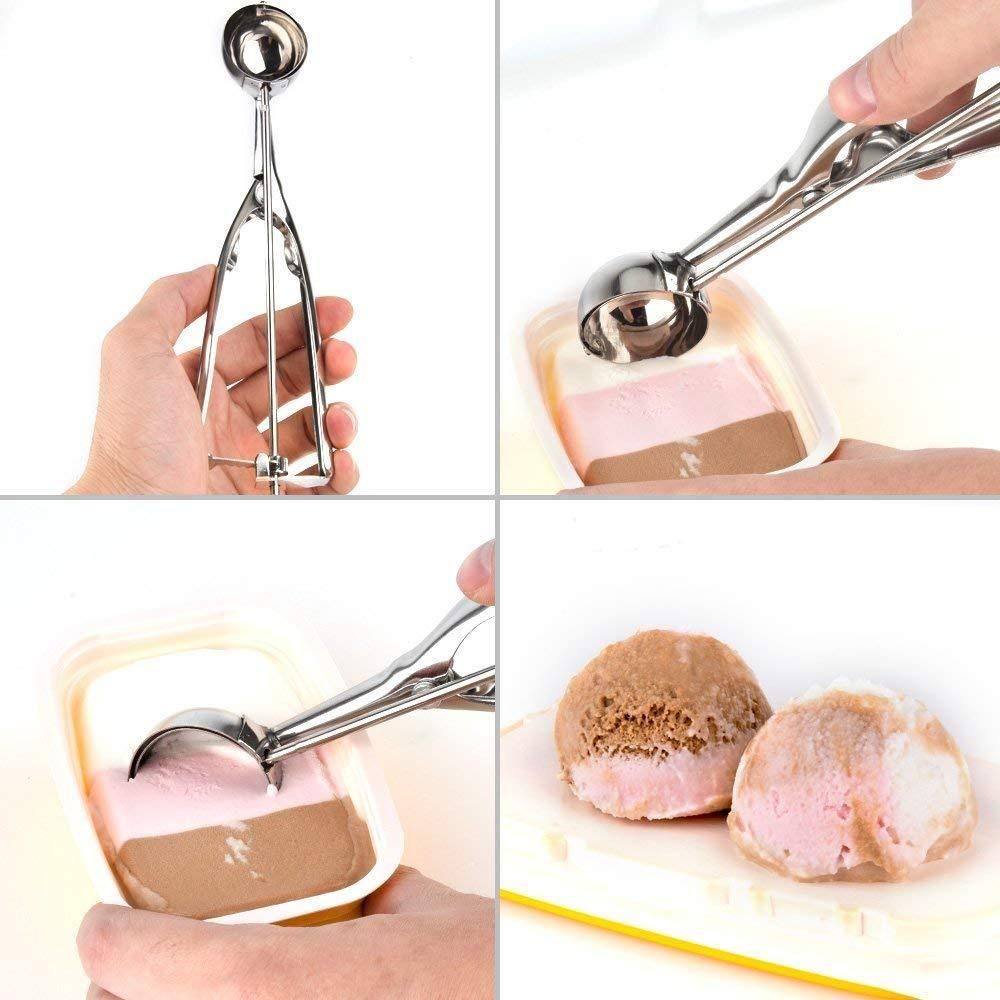 Ice cream serving spoon scooper with trigger release in use, scooping ice cream from a container.